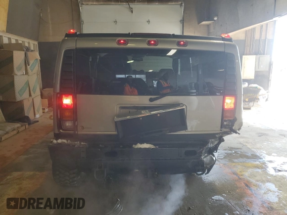 2004 Hummer H2 with VIN 5GRGN23U34H104465, listed as a Copart auction lot 41432055 with 154,346 mi miles and Salvage Title. Bid and sale history available at carsss.com. Image 6.