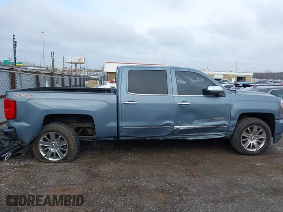2016 Chevrolet Silverado 1500 High Country with VIN 3GCUKTEC5GG131060, listed as a IAAI auction lot 41108622 with 138,372 mi miles and . Bid and sale history available at DreamBid. Image 14.