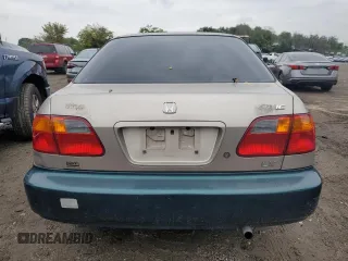 2000 Honda Civic LX with VIN 1HGEJ6675YL019892, listed as a Copart auction lot 73347734 with 400,995 mi miles and Salvage Title. Bid and sale history available at carsss.com. Image 6.
