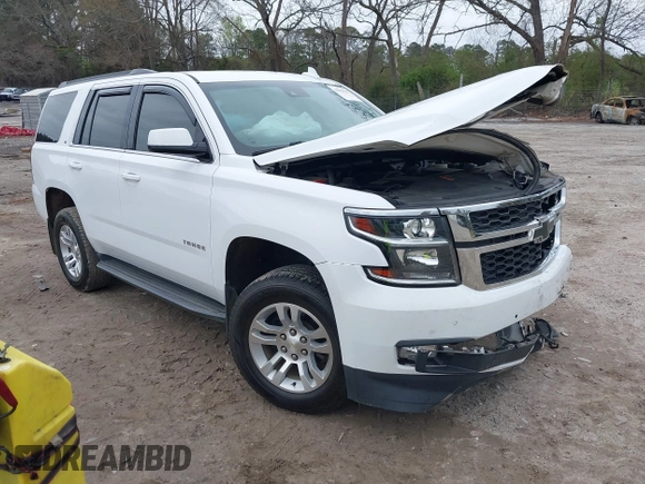 2020 Chevrolet Tahoe LT with VIN 1GNSKBKC2LR253012, listed as a IAAI auction lot 41870002 with 127,789 mi miles and . Bid and sale history available at DreamBid. Image 1.