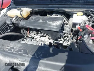 2023 Ram 1500 Big Horn with VIN 1C6RRFFG2PN649047, listed as a IAAI auction lot 42259338 with 14,986 mi miles and . Bid and sale history available at DreamBid. Image 10.