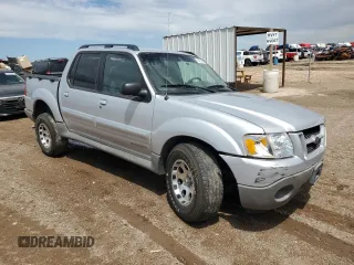 2002 Ford Explorer Sport Trac Value with VIN 1FMZU67E02UC23257, listed as a Copart auction lot 55503605 with 107,053 mi miles and Salvage title. Bid and sale history available at DreamBid. Image 4.