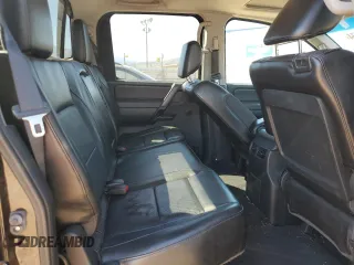 2014 Nissan Titan Pro-4X with VIN 1N6AA0EC2EN519983, listed as a Copart auction lot 71496934 with 150,259 mi miles and Salvage title. Bid and sale history available at DreamBid. Image 10.