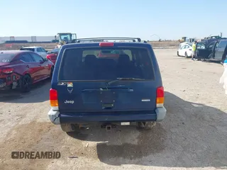 2001 Jeep Cherokee Sport with VIN 1J4FT48S01L522281, listed as a IAAI auction lot 41999570 with 261,698 mi miles and . Bid and sale history available at DreamBid. Image 16.