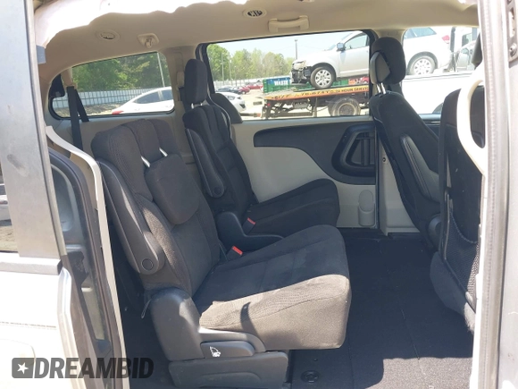 2016 Dodge Grand Caravan SXT with VIN 2C4RDGCG7GR325113, listed as a IAAI auction lot 42045811 with 86,372 mi miles and . Bid and sale history available at DreamBid. Image 8.
