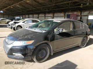 2010 Honda Insight LX z VIN JHMZE2H53AS009865, wystawiony jako Copart lot #52784865 z przebiegiem 349 579 mil mil oraz Czysty tytuł • Clean title. Historia ofert i sprzedaży dostępna na DreamBid. Obrazek 1.