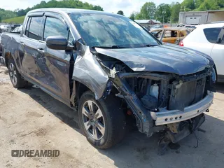 2018 Honda Ridgeline RTL-E with VIN 5FPYK3F74JB004162, listed as a IAAI auction lot 42180687 with 160,805 mi miles and . Bid and sale history available at DreamBid. Image 1.