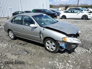 2003 Nissan Sentra XE with VIN 3N1CB51D83L695196, listed as a Copart auction lot 52225155 with 138,570 mi miles and Salvage Title. Bid and sale history available at DreamBid. Image 4.