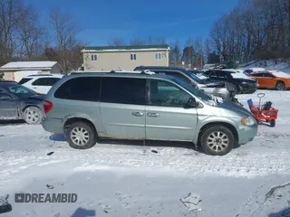 2003 Chrysler Town & Country LX with VIN 2C4GP44L43R224016, listed as a IAAI auction lot 41370108 with 122,418 mi miles and . Bid and sale history available at DreamBid. Image 13.