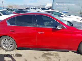 2022 Infiniti Q50 Luxe z VIN JN1EV7BP9NM312072, wystawiony jako IAAI lot #41621411 z przebiegiem 33 323 mil mil oraz . Historia ofert i sprzedaży dostępna na DreamBid. Obrazek 13.