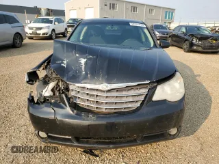 2009 Chrysler Sebring Touring z VIN 1C3LC56D69N531168, wystawiony jako Copart lot #59331415 z przebiegiem 225 463 mil mil oraz Szkoda całkowita • Salvage title. Historia ofert i sprzedaży dostępna na DreamBid. Obrazek 5.