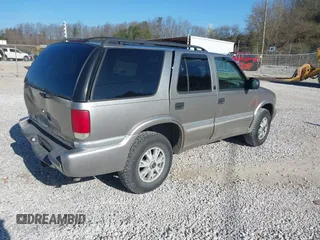 2001 GMC Jimmy SLE z VIN 1GKDT13W812117348, wystawiony jako IAAI lot #41846712 z przebiegiem 180 977 mil mil oraz . Historia ofert i sprzedaży dostępna na DreamBid. Obrazek 4.