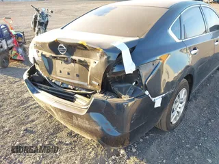 2014 Nissan Altima S with VIN 1N4AL3AP5EC421202, listed as a IAAI auction lot 40882758 with 145,440 mi miles and . Bid and sale history available at carsss.com. Image 6.
