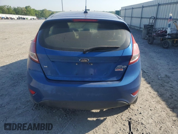 2019 Ford Fiesta SE with VIN 3FADP4EJ9KM128149, listed as a Copart auction lot 53608615 with 101,324 mi miles and Salvage title. Bid and sale history available at DreamBid. Image 6.