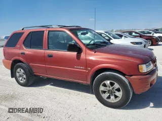 2001 Isuzu Rodeo S z VIN 4S2CK58W414317422, wystawiony jako Copart lot #75123154 z przebiegiem Nie podano mil oraz Szkody całkowita. Historia ofert i sprzedaży dostępna na DreamBid. Obrazek 4.