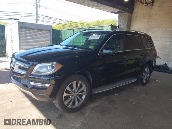 2014 Mercedes-Benz GL 450 z VIN 4JGDF7CE7EA395551, wystawiony jako IAAI lot #42247332 z przebiegiem 105 636 mil mil oraz . Historia ofert i sprzedaży dostępna na DreamBid. Obrazek 18.