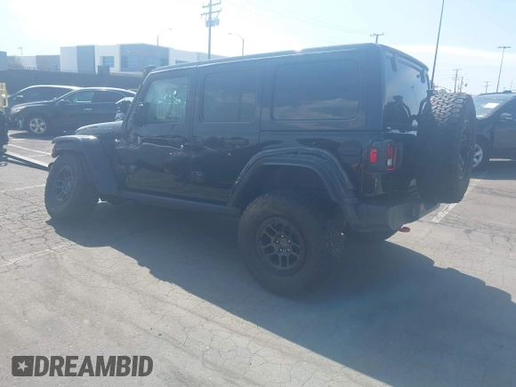2022 Jeep Wrangler Unlimited Rubicon with VIN 1C4HJXFN0NW242903, listed as a IAAI auction lot 41448636 with 28,007 mi miles and . Bid and sale history available at DreamBid. Image 3.