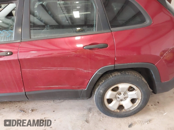 2015 Jeep Cherokee Sport with VIN 1C4PJMAB1FW708816, listed as a IAAI auction lot 41699755 with 182,507 mi miles. Bid and sale history available at carsss.com. Image 6.