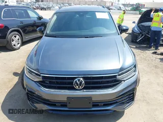 2023 Volkswagen Tiguan SE R-Line Black with VIN 3VVCB7AX8PM036684, listed as a IAAI auction lot 42169004 with 25,024 mi miles and . Bid and sale history available at DreamBid. Image 11.
