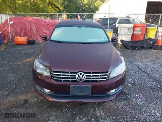 2013 Volkswagen Passat TDI SEL Premium with VIN 1VWCN7A33DC031549, listed as a IAAI auction lot 40313029 with 104,184 mi miles. Bid and sale history available at carsss.com. Image 12.