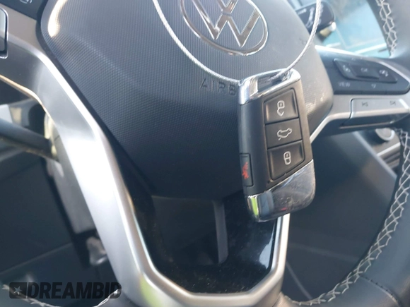 2023 Volkswagen Atlas SE z VIN 1V2DP2CA5PC556082, wystawiony jako IAAI lot #41072963 z przebiegiem 31 670 mil mil oraz . Historia ofert i sprzedaży dostępna na DreamBid. Obrazek 11.