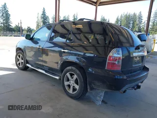 2006 Acura MDX Touring RES w/Navi with VIN 2HNYD18996H520308, listed as a IAAI auction lot 42040007 with 220,146 mi miles. Bid and sale history available at carsss.com. Image 3.