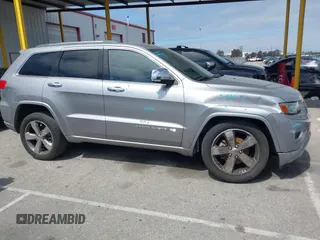 2014 Jeep Grand Cherokee Overland with VIN 1C4RJECG0EC291048, listed as a IAAI auction lot 41883941 with 81,871 mi miles. Bid and sale history available at carsss.com. Image 13.