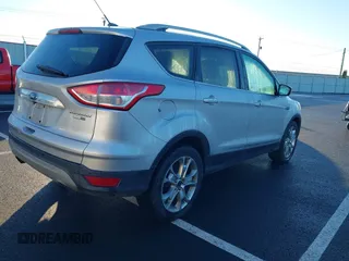 2014 Ford Escape Titanium with VIN 1FMCU9J94EUD01966, listed as a IAAI auction lot 41226043 with 132,730 mi miles. Bid and sale history available at carsss.com. Image 4.