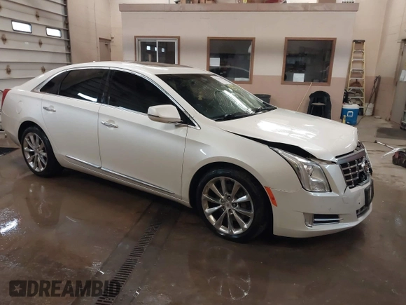 2013 Cadillac XTS Luxury with VIN 2G61R5S37D9152726, listed as a IAAI auction lot 41718331 with 88,189 mi miles and . Bid and sale history available at DreamBid. Image 1.