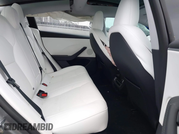 2025 Tesla Model 3 Long Range with VIN 5YJ3E1EA2SF885408, listed as a IAAI auction lot 41778498 with 1,566 mi miles and . Bid and sale history available at DreamBid. Image 8.