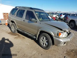 2002 Nissan Pathfinder LE with VIN JN8DR09Y82W713507, listed as a IAAI auction lot 41253781 with 302,501 mi miles. Bid and sale history available at carsss.com. Image 1.