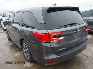 2021 Honda Odyssey Touring with VIN 5FNRL6H86MB021504, listed as a IAAI auction lot 41550040 with 55,068 mi miles. Bid and sale history available at carsss.com. Image 3.