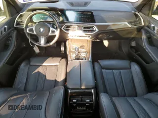 2022 BMW X5 xDrive45e with VIN 5UXTA6C0XN9J37988, listed as a Copart auction lot 47203815 with 27,883 mi miles and Salvage Title. Bid and sale history available at carsss.com. Image 8.