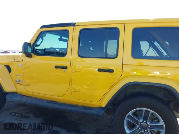 2018 Jeep Wrangler Unlimited Sahara z VIN 1C4HJXEN3JW306282, wystawiony jako IAAI lot #42302821 z przebiegiem 70 204 mil mil oraz . Historia ofert i sprzedaży dostępna na DreamBid. Obrazek 15.
