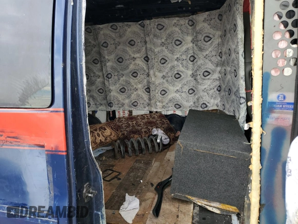 2003 GMC Savana Cargo z VIN 1GTHG35U831180029, wystawiony jako Copart lot #64697054 z przebiegiem Nie podano mil oraz Nie do naprawy • Non repairable. Historia ofert i sprzedaży dostępna na DreamBid. Obrazek 11.