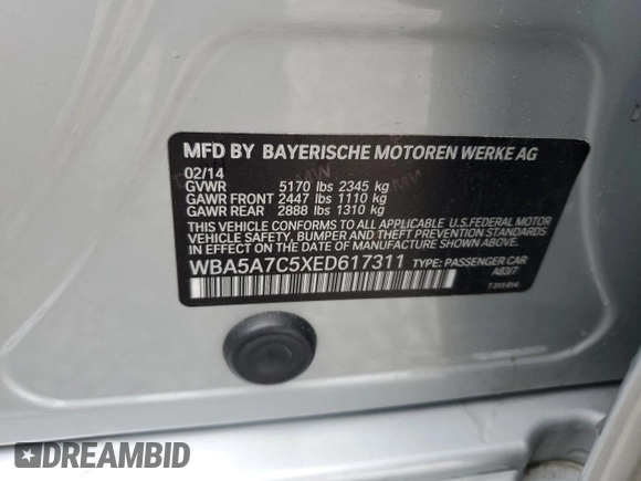 2014 BMW 5 Series 528i xDrive z VIN WBA5A7C5XED617311, wystawiony jako Copart lot #59398195 z przebiegiem 117 230 mil mil oraz Szkoda całkowita • Salvage title. Historia ofert i sprzedaży dostępna na DreamBid. Obrazek 13.