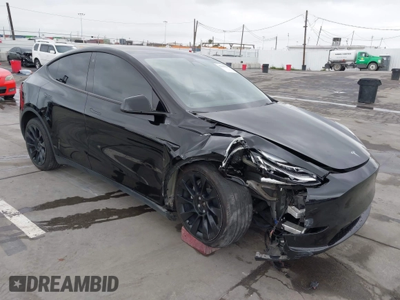 2022 Tesla Model Y Long Range z VIN 7SAYGDEE0NF508958, wystawiony jako IAAI lot #42191819 z przebiegiem 60 880 mil mil oraz . Historia ofert i sprzedaży dostępna na DreamBid. Obrazek 1.