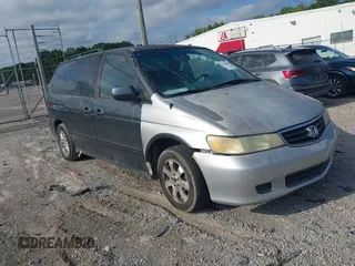 2003 Honda Odyssey EX-L with VIN 5FNRL18023B158015, listed as a IAAI auction lot 42729003 with Not provided miles and . Bid and sale history available at DreamBid. Image 1.