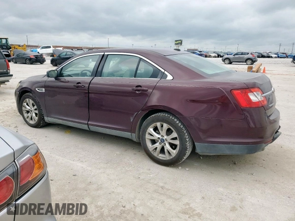 2011 Ford Taurus SEL z VIN 1FAHP2EW6BG183640, wystawiony jako Copart lot #54662745 z przebiegiem 149 309 mil mil oraz Szkoda całkowita • Salvage title. Historia ofert i sprzedaży dostępna na DreamBid. Obrazek 2.