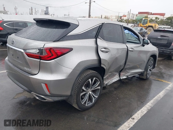 2017 Lexus RX 350 with VIN 2T2ZZMCA8HC066740, listed as a IAAI auction lot 41734449 with 54,673 mi miles and . Bid and sale history available at DreamBid. Image 4.