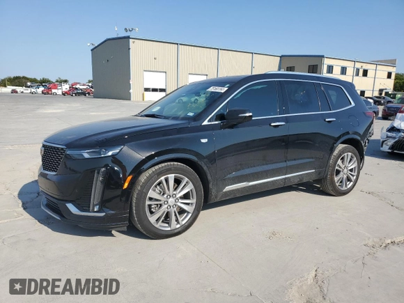 2024 Cadillac XT6 FWD Premium Luxury with VIN 1GYKPCRS7RZ710803, listed as a Copart auction lot 75160764 with 10,409 mi miles and Salvage Title. Bid and sale history available at carsss.com. Image 1.
