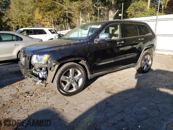 2011 Jeep Grand Cherokee Overland with VIN 1J4RS6GG7BC646610, listed as a Copart auction lot 79931614 with 188,601 mi miles and Salvage Title. Bid and sale history available at DreamBid. Image 1.