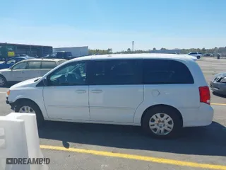 2016 Dodge Grand Caravan SE with VIN 2C4RDGBG3GR398660, listed as a IAAI auction lot 41899048 with 157,551 mi miles. Bid and sale history available at carsss.com. Image 14.
