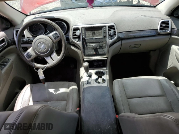 2011 Jeep Grand Cherokee Laredo with VIN 1J4RR4GG5BC543248, listed as a Copart auction lot 61735955 with 153,547 mi miles and Salvage title. Bid and sale history available at DreamBid. Image 8.