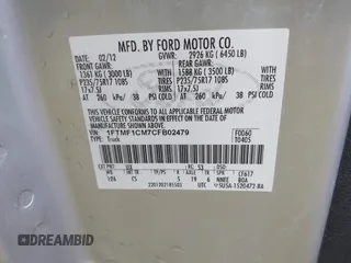 2012 Ford F-150 XL with VIN 1FTMF1CM7CFB02479, listed as a IAAI auction lot 41173983 with 168,433 mi miles. Bid and sale history available at carsss.com. Image 9.