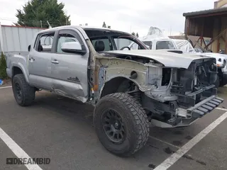 2020 Toyota Tacoma 4WD SR5 with VIN 3TMCZ5AN6LM351233, listed as a IAAI auction lot 41383714 with 1 mi miles. Bid and sale history available at carsss.com. Image 1.