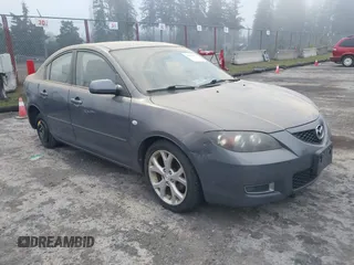 2009 Mazda Mazda3 i Touring Value with VIN JM1BK32G291214834, listed as a IAAI auction lot 40894075 with 128,040 mi miles. Bid and sale history available at carsss.com. Image 1.