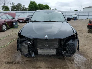 2015 BMW X4 xDrive35i with VIN 5UXXW5C55F0E87384, listed as a Copart auction lot 56299284 with 182,434 mi miles and Clean Title. Bid and sale history available at carsss.com. Image 5.