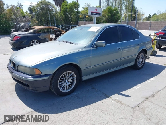 2003 BMW 5 Series 530iA with VIN WBADT63413CK33315, listed as a IAAI auction lot 42064612 with 205,426 mi miles. Bid and sale history available at carsss.com. Image 2.