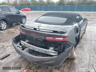 2018 Chevrolet Camaro 1LT with VIN 1G1FB3DX8J0124766, listed as a IAAI auction lot 41737430 with 101,028 mi miles. Bid and sale history available at carsss.com. Image 4.